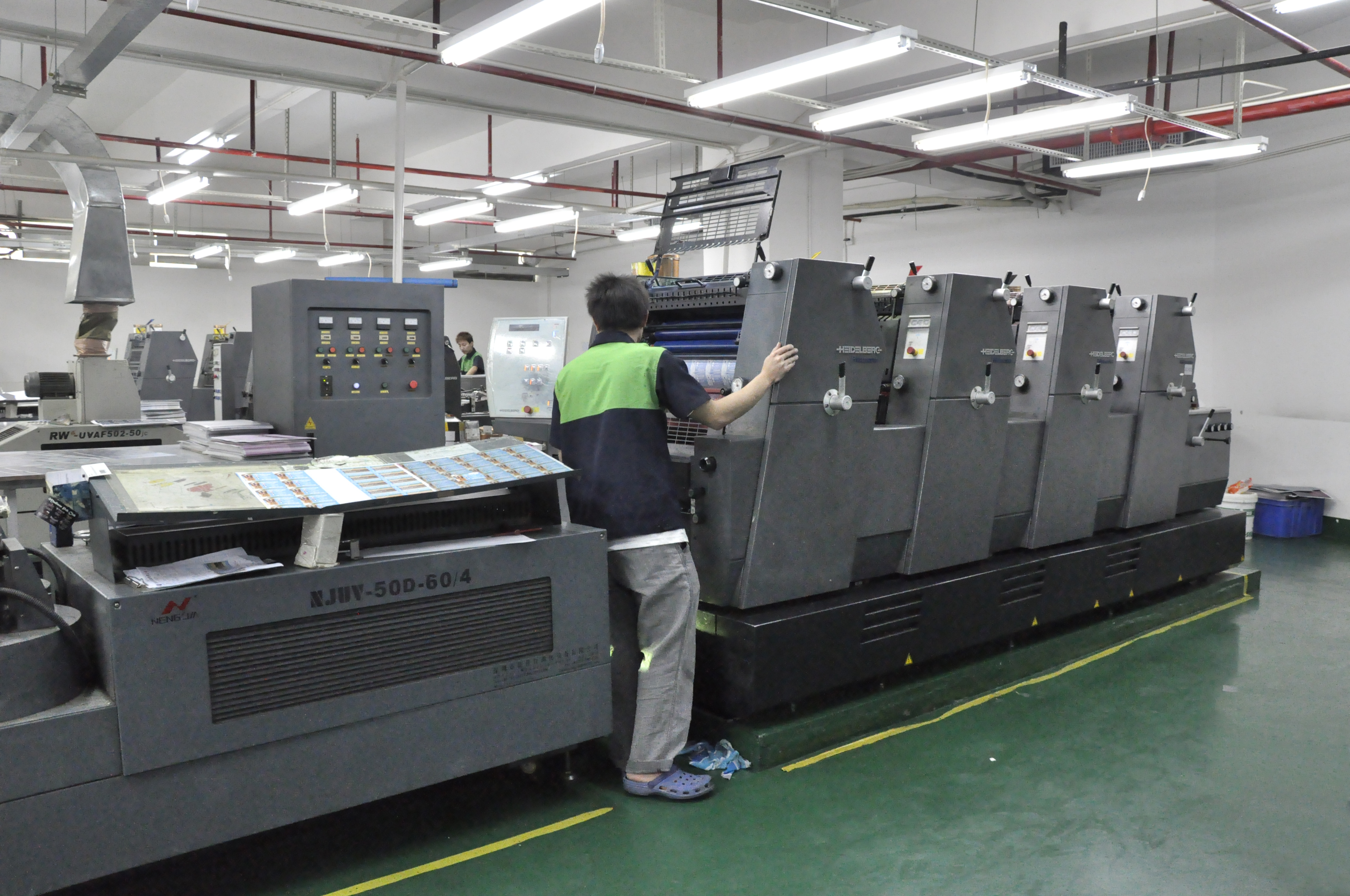 Four color offset printing press